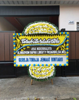 Papan Bunga Duka di Bilabong Jaya